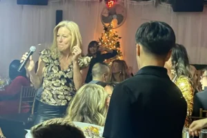 Liza singing to restaurant guests during an interactive live music performance in northern New Jersey