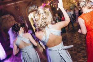 Guests dancing at an upscale celebration showing the energy live music can bring to an event