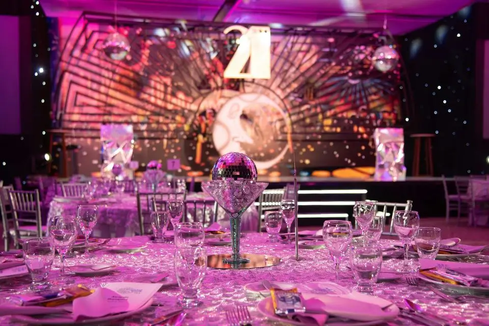 Elegant ballroom prepared for a corporate awards dinner and company celebration