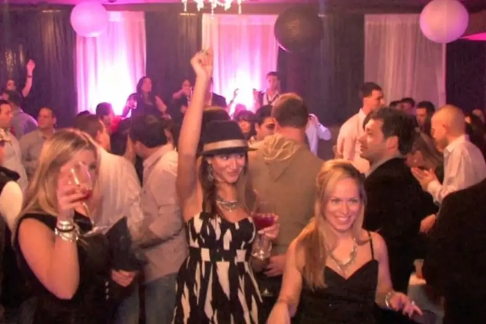 Guests enjoying music and dancing at a lively corporate event with live music in New Jersey
