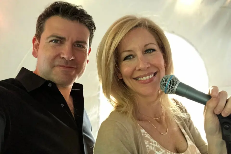 Liza and Josh with a microphone providing live entertainment for private parties in NJ