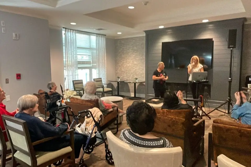 Musicians performing live for residents inside an 55+ independent living community in New Jersey