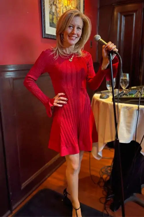 Female live singer performing with a microphone for private party entertainment in NJ
